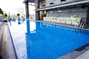 ATC Furniture’s poly rattan wicker sofa at Pullman Saigon Center’s pool site