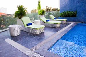 Wicker sun loungers at Pullman Saigon Center by ATC Furniture Supplier