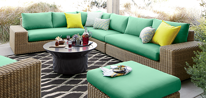 Neutral-tone-sofa-with-colorful-pillows-and-cushions Neutral tone sofa with colorful pillows and cushions