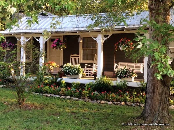 Classic-front-porch-with-rockers-and-swing-chair Classic front porch with rockers and swing chair