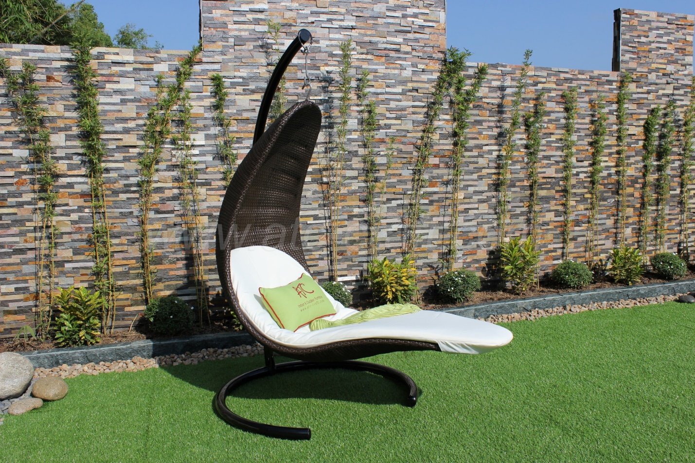 A-wicker-hanging-sun-lounger-by-atc-furniture A wicker hanging sun lounger - by ATC Furniture