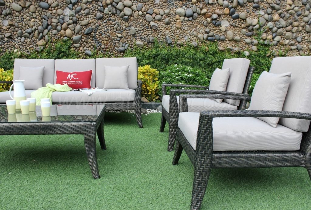 A neat and light poly rattan sofa chairs and tables