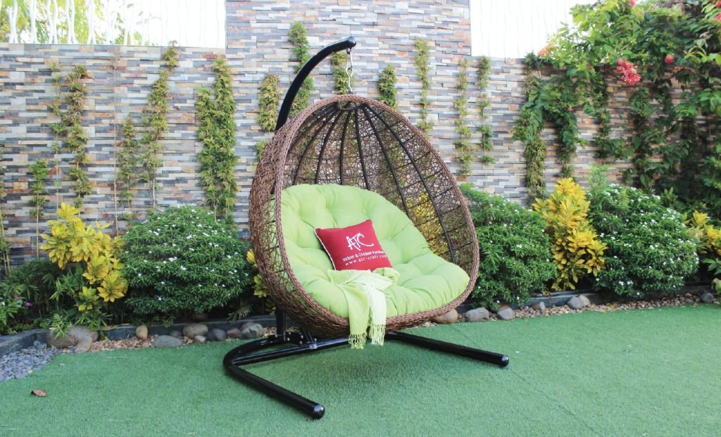 Outdoor double swing chair with birds nest image